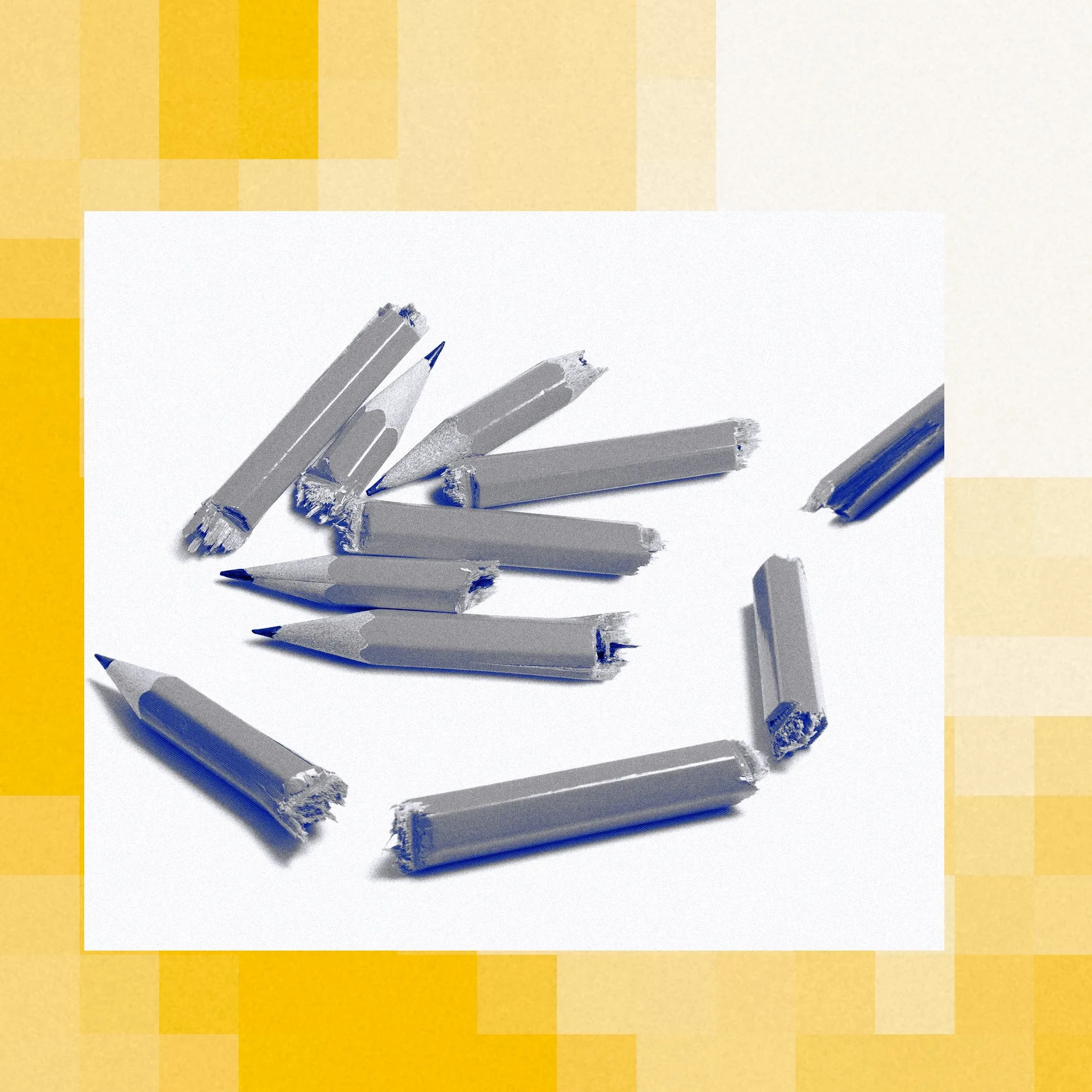 Broken pencils on paper.